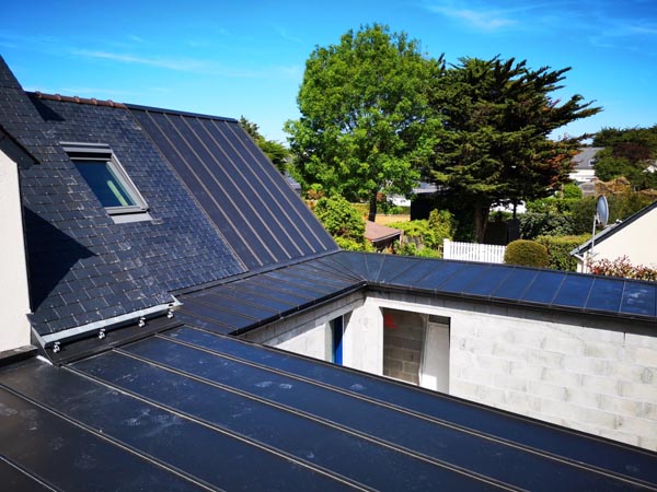 Toit réalisé en Zinc en multi-pentes