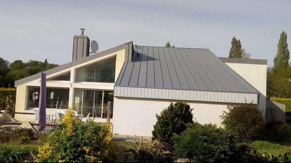 Maison avec couverture en Zinc