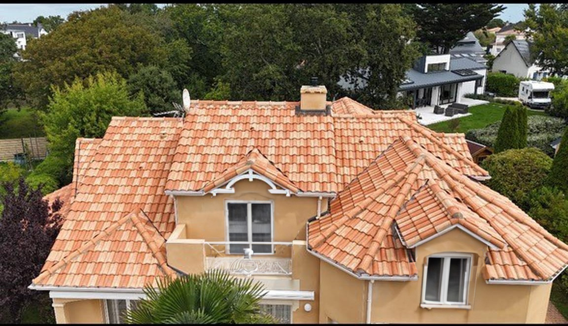 Maison avec couverture en Tuiles